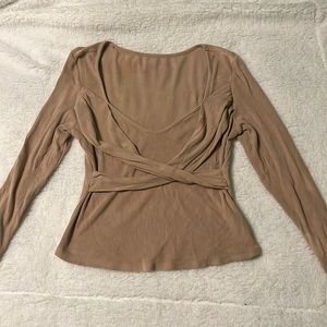 Tan cross-cross top.